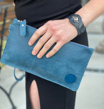 Denim blue leather wristlet handbag